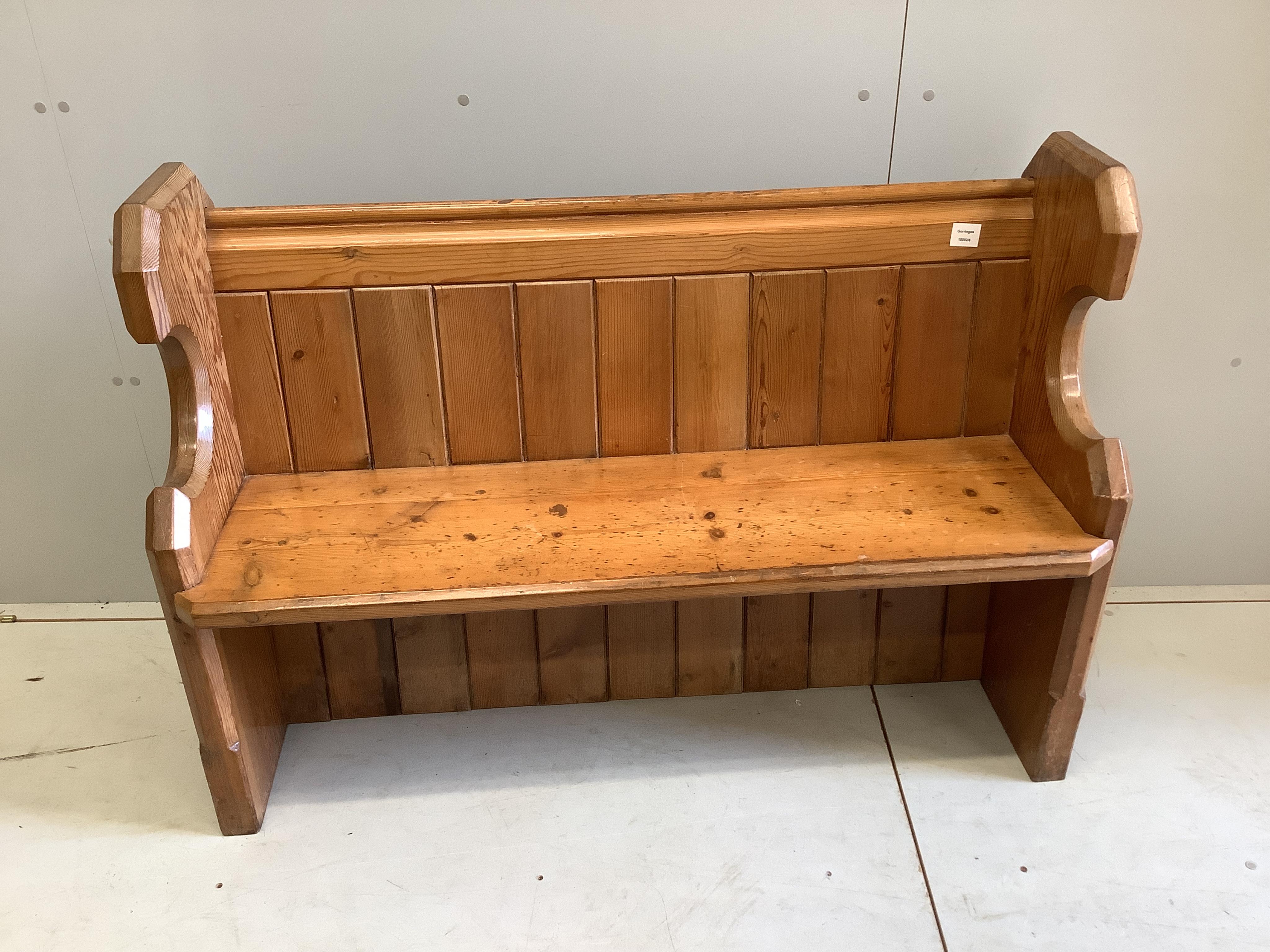 A Victorian pitch pine pew, width 123cm, depth 44cm, height 86cm. Condition - fair